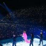 Shania Twain Instagram - You know I had to give a little extra drama with my outfit for the final US show of the #QueenOfMeTour - I love how much motion and dancing fabric is in these photos 💖 What a night in Fargo! 19,000 people scream singing along to every word, it felt super special. Now, we're in the final run of shows, ending tour in Canada felt only right... Winnipeg, see your beautiful faces tonight. Fargo, ND