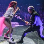 Shania Twain Instagram - We were ROCKIN’ in Buffalo 💥 I took inspiration from some of my favorite female punk rockers for my show outfit - @benatargiraldo, @blondieofficial, @heartofficial… edgy femininity. I just love the contrast of the pink tutu against the boots! Plus jumping around onstage is much easier in docs than heels!! 😂 Buffalo, New York