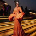 Shibani Dandekar Instagram - Thank you to the Ambani family for putting together such spectacular pre wedding festivities and for being such warm, gracious hosts. Congratulations Anant & Radhika! Wishing you so much love and happiness. It was an honour to perform at such a special occasion wearing this beautiful @manishmalhotra05 🧡 @manishmalhotraworld