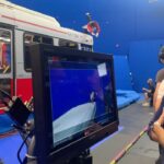 Simu Liu Instagram - Every breathtaking stunt in our movie is the result of months of previsualization, choreography, rehearsal, rigging and testing before we get to the shoot day. And as far as stunt teams went, we had the very best in the world. Stunts like this baseball slide off the front of a bus felt straightforward in rehearsal, but was a whole different ballgame once you factored in the hydraulics and the wind machines. When you insist on practical effects, you pay the human price. The bumps and scrapes add up and in my case resulted in my knee swelling up to the size of a tennis ball after this day. Still, they had to drag me off that bus; I wanted to go over and over again, until it was perfect, and then some. I loved every second of it. Catch @ShangChi and the Legend of the Ten Rings in cinemas now, and witness some of the most incredible action sequences to grace the MCU!