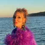 Sina Deinert Instagram - „HOLIDAY“ Music Video is OUT NOW!! 💜