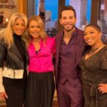 Skylar Astin Instagram - Had a great time sitting down with @kellyripa and @dejavuspeaks on @livekellyandryan today! It’s my mother @queenmerrie ‘s favorite show! So we got to talk all things @sohelpmecbs , my new song ‘Gravity’, and even the legend that is Queen Merrie! Suit: @stylebysarai Grooming: @haileicall Style: @sarahdarceystyle New York City