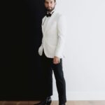 Skylar Astin Instagram - 🤍🖤 Gentler Scarface 🖤🤍 Photographer: @francisgum Suit: @jackvictorofficial Stylist: @benjaminholtrop Stylist Assistant: @emilykejohnson Grooming: @biabiabia Tailoring: @carlos_thetailor Los Angeles, California