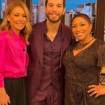 Skylar Astin Instagram – Had a great time sitting down with @kellyripa and @dejavuspeaks on @livekellyandryan today! It’s my mother @queenmerrie ‘s favorite show! So we got to talk all things @sohelpmecbs , my new song ‘Gravity’, and even the legend that is Queen Merrie!

Suit: @stylebysarai 
Grooming: @haileicall 
Style: @sarahdarceystyle New York City