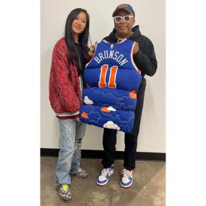 Spike Lee Instagram - Shout To Artist Jocelyn Hu For Designing This HYPED,DOPE JALEN BRUNSON NY KNICKS Jersey/Vest. I Will Be Rockin’ This Tonight Courtside (Where Else😂) At Da Garden Debut Of Sensation VICTOR WEMBANYAMA.HISTORIC NIGHT At Da Worlds’ Most Famous Arena. ORANGE AND BLUE SKIES🏀🏀🏀