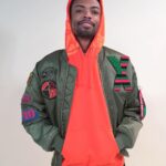 Spike Lee Instagram - Our Limited Edition Collab With Legendary Manufactuer @Alphaindustries X Spike’s Joint/40 Acres Includes A Special Edition Flight Jacket, Hoodie Sweatshirt, And Long Sleeve T-Shirt. The Flight Jacket Is Reversible With The 40 Acres Logo On The Inside And Has 6 Removable Velcro Patches. The Hoodie Is Printed With A Large Graphic That Matches The Back Of The Shirt. These Joints Are Gonna Go Fast. Don’t Sleep! Click The Product Link On IG Story Or Click The Link In The Bio To Shop For This And Many More