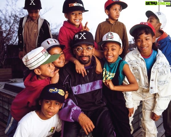 Spike Lee Instagram - #ThrowbackThursday: Taken in the early 90s, Spike is pictured here with kids wearing an assortment of our original 40 Acres caps once sold in the original Spike’s Joint storefronts. Did you own some back in the day? Which one would you like to see return? 📸: @george.lange