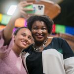Stacey Abrams Instagram - I was glad to join the Mexican and Latino community as they commemorate Día de los Muertos yesterday at Plaza Las Americas. Your support means so much to me. Remember to vote early by tomorrow, and remind your friends and family to do the same. http://staceyabrams.com/voting