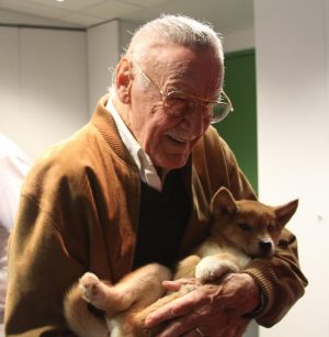 Stan Lee Instagram - What could be more adorable than Stan cradling a dingo? 🐕 
Nothing, in our opinion. 
#StanLee #ThrowbackThursday #AdorableAnimals