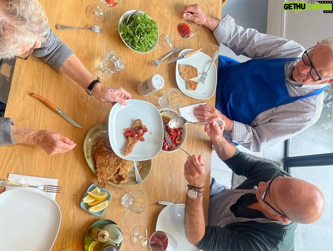 Stanley Tucci Instagram - Home cooking with a lot of my loved ones. Veal Milanese ⠀ ⠀ • Pound out veal escalope until thin. ⠀ • Salt. ⠀ • Dredge in egg and then breadcrumbs. ⠀ • Immediately fry in a mix of clarified butter and olive oil till browned on both sides. ⠀ • Serve. ⠀ • Top with tomatoes chopped, mixed with parsley and salted and some rocket. London, United Kingdom