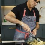 Stanley Tucci Instagram - • • • Here is Felicity and I pretending to get along while we make Spaghetti con zucchine alla Nerano. We discovered this dish at @ristoranteloscoglio on the Amalfi coast and now we make it all the time at home (having learnt to make it properly while filming Searching for Italy!) The recipe can be found in my memoir TASTE which you can pre-order from the link in my bio.