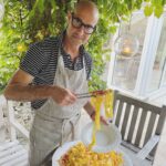 Stanley Tucci Instagram - Pasta alla Martina - fresh tomato sautéed with garlic, oil and white wine, fresh asparagus, peas, shrimp and basil. Tossed together with pappardelle. Felicity thinks it would have been better with spaghetti.