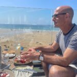 Stanley Tucci Instagram - A rare few days respite alone with @felicityblunt at @watergatebay where the sun was shining, the food (best Greek salad ever) was incredible and the rooms a delight. Could not have hoped for more. We walked the costal path and she did really well to keep up. (When keeping up means being 20 yards ahead the whole time). Very proud of her. Watergate Bay Hotel