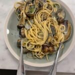 Stanley Tucci Instagram – Happy as a clam. ⠀
⠀
⠀
⠀
• 1 pound spaghetti ⠀
• 1 pound of clams (smaller the better)⠀
• handful of chopped parsley⠀
• 2 cloves of garlic roughly chopped ⠀
⠀
**serves 4 OR me and my wife⠀
⠀
– Put your clams in a bowl of very salty water for 20 minutes to purge them of any dirt. Discard any that are open before cooking. ⠀
⠀
– Put the pasta on to boil in salted water ⠀
⠀
– Place a large frying pan on a medium to high heat add a glug of extra virgin Olive oil.  throw in your garlic and cook for one minute until soft (move garlic around the pan to prevent it from burning)⠀
⠀
– Add your clams to the frying pan and turn heat to high. Cook until all or nearly all are open. ⠀
⠀
– Add your parsley ⠀
⠀
– Drain pasta reserving one cup of pasta water ⠀
⠀
– Add cooked pasta to the frying pan with half of the reserved pasta water and toss. (Add more water if it looks too dry)⠀
⠀
– Add salt and a splash of extra virgin olive oil to taste. London