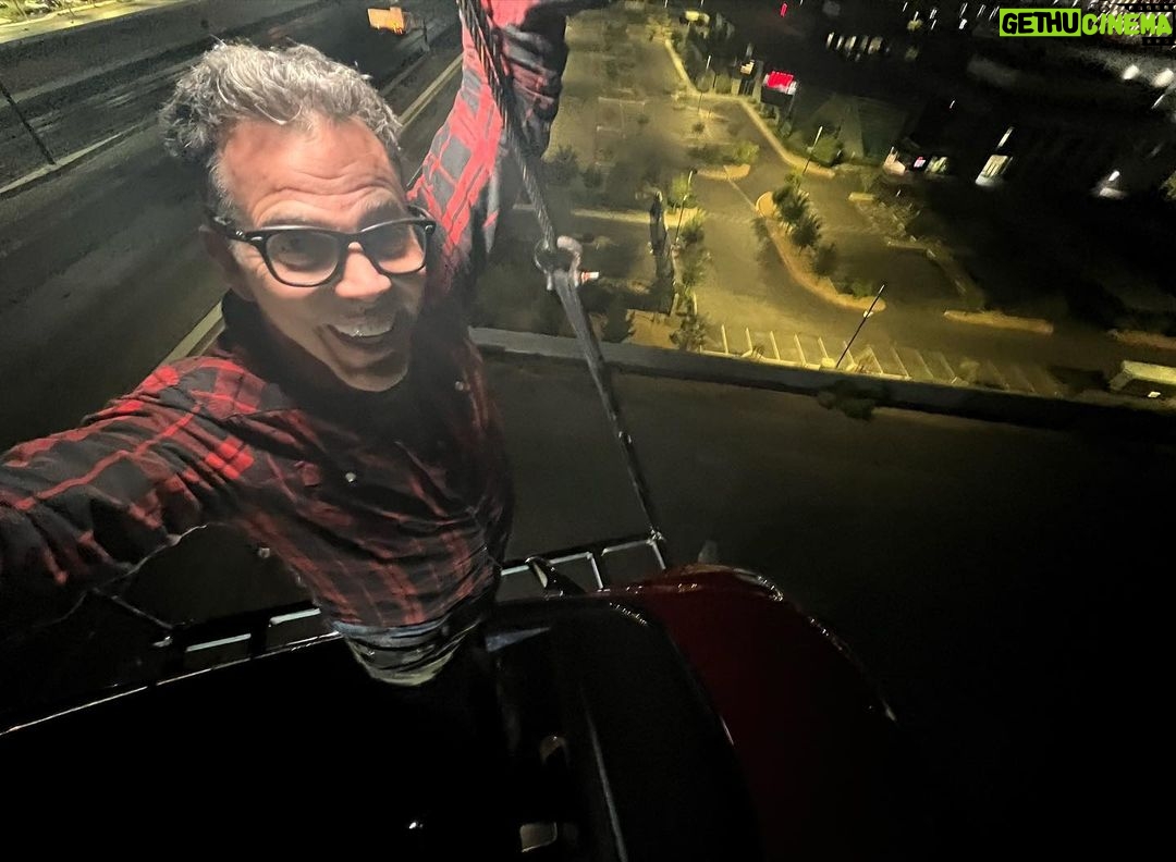 Steve-O Instagram - I’m in that car RIGHT NOW, hanging 100ft above the @ufc headquarters, and I will remain in here until the @ufc fights are about to start at 1pm PST today (Saturday). I came to Las Vegas for my show at the Virgin Casino Theater this Sunday (tomorrow) and I told @danawhite my idea for sleeping in my car while hanging from a crane… and he said I could do it here. That was TWO DAYS AGO, and (thanks to @theotherguysllc) we already put it together from scratch!!! I can never thank @danawhite enough, what an unbelievable honor to be bros with him. I’m crashing out now, but cruise by the @ufc APEX for a selfie with me (I’ll climb back on the roof of the car up here around 11am or noon, and hit the link in my bio for tickets to my show in Vegas tomorrow (Sunday), and everyone tune in for the fights at 1pm PST!