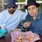 Sunny Deol Instagram - Papa and I enjoying a pizza peacefully. ❤️