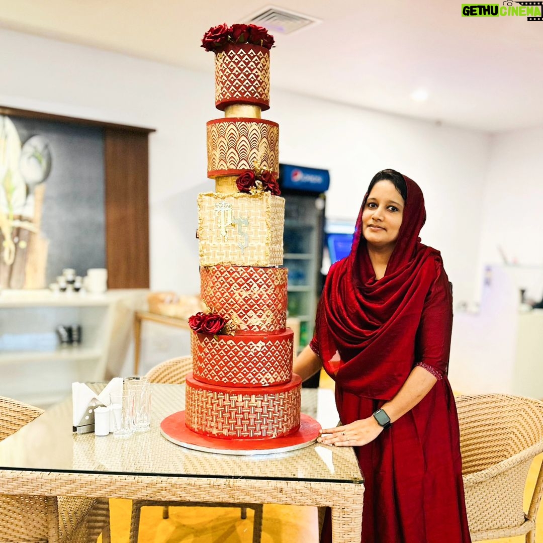 Swasika Instagram - 8 tier Royal wonder for Swasika’s wedding reception When Swasika contacted me 4 months before her wedding, I had no idea that I would be making something like this for her. All she wanted was something Red, Elegant & Royal. And from there the discussions started and ended with this 8 tier beauty! The look on Swasika’s face when she saw her cake was worth all the effort I put into it… The entire cake was covered in fondant. The red colour was particularly customised and hand rolled to suit her liking. The beige square tier was a last minute addition inspired by her wedding saree blouse. Each tier was meticulously stencilled with Royal icing and hand painted gold. I added fondant accents to enhance the overall look. The entire look was completed with a custom acrylic topper that included the bride and groom’s initials and some flowers . . The cake design was inspired by @indulgencebyshazneenali and @cakestrybyfathimaiqbal wedding cakes RECCAA Club