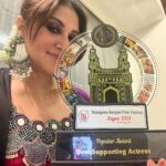 Swastika Mukherjee Instagram – We are the happiest when we receive accolades for our hard work. 
I just got TWO 🌹🌹
Best supporting actress JURY 
Best supporting actress POPULAR 
for my film #BijoyarPore at the Telengana Bengali Film Festival. 
Thank you @abhijitsridasofficial for trusting me with Mrinmoyee. 
A film is always a team effort. 
It’s a win for the team.
.
Thank you @sumanakanjilal di for having me over. And cheers to the entire team of @bangaleesamity_hyderabad for the warmth and love 💝
Thank you @nupurkanoi for being there with me on my special day. 

Outfit – @nupurkanoiofficial @nupurkanoi 
Make up – @prosenjit4867 
Hair – yours truly Hyderabad