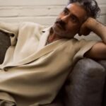 Taika Waititi Instagram - If you're sick of seeing me being iconic and putting every other human male 6 feet under with just one lewk, then try having to live in this body and look in the mirror EVERY DAY. Some say it's a blessing, others a curse, I say it's a blursing. @danascruggs took these photos and had to replace the cameras afterwards. Or get them bleached, can't remember. The main thing is that @nytimes exploited me just to make you to go see Thor: Love & Thunder which opens July 8. Get in it ya mutts. Stylus: @jeanneyangstyle Kleidung: @kingandtuckfield Face job: @melissa.dezarate Foto werk: @danascruggs Model: GOD