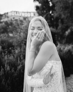 Taika Waititi Instagram - Happy anniversary, @RitaOra and @TaikaWaititi! To celebrate their special day, the couple has shared their never-before-seen wedding album with Vogue. Over the past year, information about their nuptials has spread like wildfire across the internet—not all of it correct. “It’s actually been quite entertaining for us to see the different stories people made up and all the while getting to keep it to ourselves,” Rita admits. “And, I love that we now get to share what really happened—and to do it on our one year anniversary no less!” “Rita [Ora] proposed to me, and I said ‘yes’ instantly,” filmmaker Taika Waititi says of how he and the singer-songwriter became engaged. While the pair first met at a barbecue in 2018 that Taika hosted at his house in L.A., it wasn’t until 2021, when they were both filming in Australia, that they began dating. Rita popped the question while on vacation in Palm Springs in the summer of 2022, and they planned an impromptu wedding to be held in Los Angeles a few weeks later, on August 4. “It wasn’t in London or in France like everyone reported,” Taika clarifies. “It was in L.A. with a small group of friends.” See all the photos from their big day at the link in our bio. Photo: @jackgorlin