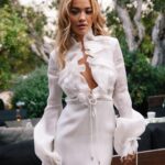 Taika Waititi Instagram - Happy anniversary, @RitaOra and @TaikaWaititi! To celebrate their special day, the couple has shared their never-before-seen wedding album with Vogue. Over the past year, information about their nuptials has spread like wildfire across the internet—not all of it correct. “It’s actually been quite entertaining for us to see the different stories people made up and all the while getting to keep it to ourselves,” Rita admits. “And, I love that we now get to share what really happened—and to do it on our one year anniversary no less!” “Rita [Ora] proposed to me, and I said ‘yes’ instantly,” filmmaker Taika Waititi says of how he and the singer-songwriter became engaged. While the pair first met at a barbecue in 2018 that Taika hosted at his house in L.A., it wasn’t until 2021, when they were both filming in Australia, that they began dating. Rita popped the question while on vacation in Palm Springs in the summer of 2022, and they planned an impromptu wedding to be held in Los Angeles a few weeks later, on August 4. “It wasn’t in London or in France like everyone reported,” Taika clarifies. “It was in L.A. with a small group of friends.” See all the photos from their big day at the link in our bio. Photo: @jackgorlin