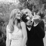 Taika Waititi Instagram - Happy anniversary, @RitaOra and @TaikaWaititi! To celebrate their special day, the couple has shared their never-before-seen wedding album with Vogue. Over the past year, information about their nuptials has spread like wildfire across the internet—not all of it correct. “It’s actually been quite entertaining for us to see the different stories people made up and all the while getting to keep it to ourselves,” Rita admits. “And, I love that we now get to share what really happened—and to do it on our one year anniversary no less!” “Rita [Ora] proposed to me, and I said ‘yes’ instantly,” filmmaker Taika Waititi says of how he and the singer-songwriter became engaged. While the pair first met at a barbecue in 2018 that Taika hosted at his house in L.A., it wasn’t until 2021, when they were both filming in Australia, that they began dating. Rita popped the question while on vacation in Palm Springs in the summer of 2022, and they planned an impromptu wedding to be held in Los Angeles a few weeks later, on August 4. “It wasn’t in London or in France like everyone reported,” Taika clarifies. “It was in L.A. with a small group of friends.” See all the photos from their big day at the link in our bio. Photo: @jackgorlin