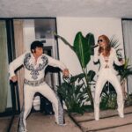 Taika Waititi Instagram - Happy anniversary, @RitaOra and @TaikaWaititi! To celebrate their special day, the couple has shared their never-before-seen wedding album with Vogue. Over the past year, information about their nuptials has spread like wildfire across the internet—not all of it correct. “It’s actually been quite entertaining for us to see the different stories people made up and all the while getting to keep it to ourselves,” Rita admits. “And, I love that we now get to share what really happened—and to do it on our one year anniversary no less!” “Rita [Ora] proposed to me, and I said ‘yes’ instantly,” filmmaker Taika Waititi says of how he and the singer-songwriter became engaged. While the pair first met at a barbecue in 2018 that Taika hosted at his house in L.A., it wasn’t until 2021, when they were both filming in Australia, that they began dating. Rita popped the question while on vacation in Palm Springs in the summer of 2022, and they planned an impromptu wedding to be held in Los Angeles a few weeks later, on August 4. “It wasn’t in London or in France like everyone reported,” Taika clarifies. “It was in L.A. with a small group of friends.” See all the photos from their big day at the link in our bio. Photo: @jackgorlin