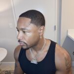 Tank Instagram - I’m not only a share holder i’m also client! @rewindit10 at work! Why fight the time when you can rewind the time!!!.. The box with my face on it contains the fountain of youth!..🤣😎🤷🏽‍♂️ 💈 @daboondini R&B MONEY