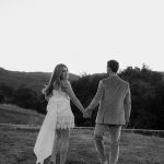 Taylor Lautner Instagram – REHEARSAL DINNER
We knew from day one we wanted to use as many different spaces at Epoch Estate Wines as possible to showcase why we love the property so much and to provide a different experience for our guests each and every night. Doing rehearsal dinner in the underground barrel cellar was a no brainer. A small intimate and romantic atmosphere to celebrate our love (and a delicious meal) with the closest people in our lives. Guests sat at a beautiful table in crystal chairs that bounced off the ambient lighting and candles that lined the room. We wanted to celebrate girl Tays Greek heritage by designing a family style Mediterranean menu paired perfectly with some of our favorite Epoch wines. The room was filled with love, laughter and excited anticipation of the weekends celebrations to come.
Planning and Event Design @samkoma.world
Venue @epochwines
Photography @nicoleivanovphoto
Lighting @tn_event_designs
Styling @soniayoungstyle