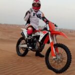 Taz Skylar Instagram - Straight of or the Ferrari, as the sun is setting we’re rushed on to a pair of 450 KTM’s in the desert and rode out into the dunes, doing our best to navigate the sand sliding under our wheels 🏜️ @vdpvincent Al Badayer Desert