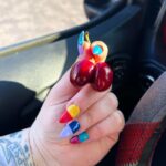 Tess Holliday Instagram - My birthday is less than a week away 🥳 & I’m busy making Pinterest boards, working on my next self love workshop, & building fairy🧚🏻 gardens with Bowie (why aren’t there more diverse fairies?! 🧚🏽‍♀️✨🧚🏻🥺 I’ve scoured the internet & the only ones I can find are in this slide?!Help!) Anyway I love Summer, I love fat babes in 👙& eating 🍒 in the sunshine! Who’s joining me?? 😋☀️ nails inspired by @pinterest so make sure to follow me on there: tessholliebae 🍒✨ #cancerszn #cancer♋ #pinterestinspired #pinterestnails #summernails #summerbaby