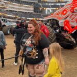Tess Holliday Instagram - you can keep coachella, I’m a monster truck girl🤘🏻🛺🤣🛞 thank you as always to @thebillhorn & @marquecomm for making @monsterjam a tradition in our family & something we look forward to every year! I’m so glad my step mom got to experience it with us this time too & I want to publicly apologize bc she is still sad I didn’t introduce her to @sarahmgellar aka Daphne (Buffy to me🔪) 😩 hair @angelinapanelli duh tee @ebay vintage shorts @goodamerican purse @evilpork666 ❤️‍🩹 attitude baby jesus #monsterjam #monstertrucks #sofistadium #vintageclothing SoFi Stadium