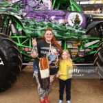 Tess Holliday Instagram - you can keep coachella, I’m a monster truck girl🤘🏻🛺🤣🛞 thank you as always to @thebillhorn & @marquecomm for making @monsterjam a tradition in our family & something we look forward to every year! I’m so glad my step mom got to experience it with us this time too & I want to publicly apologize bc she is still sad I didn’t introduce her to @sarahmgellar aka Daphne (Buffy to me🔪) 😩 hair @angelinapanelli duh tee @ebay vintage shorts @goodamerican purse @evilpork666 ❤️‍🩹 attitude baby jesus #monsterjam #monstertrucks #sofistadium #vintageclothing SoFi Stadium