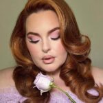Tess Holliday Instagram – Growing up I never felt “pretty”, & I definitely didn’t like what I saw in the mirror. I know beauty is more than makeup & getting dressed up, but seeing myself in full glam for the first time truly changed my life. I was a makeup artist long before I ever stepped on set as a model, so my love for makeup runs deep. @marianamcgrathmakeup has been one of my favorites artists to create with the last few years & every time she touches my face I swear I don’t know how to act. I love you Mari, your talent is endless. 💕Hair by the iconic @alanaschober ilysm too! #glam #makeup #makeuplover #glamgirl