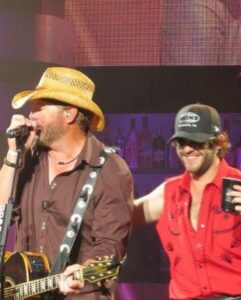 Thomas Rhett Instagram - It breaks my heart to hear about the passing of Toby Keith… I’ve known Toby since I was a kid. He used to run around in the same circle as my dad. When I signed my first record deal in 2012, Toby was the very first person to take me on tour… I watched his show every single night just trying to soak up as much as I could. I learned so much about how to write songs, how to perform, and how to entertain from Toby Keith. I am so honored to say that I got to share the stage with him. Toby - I hope your soul rests easy brother.