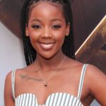Thuso Mbedu Instagram - The Flash premiere. On a new level 🚀 Dress: @reformation Necklace: @angarajewelry Bag: @prada Makeup: @makeupbyhendra Driven by: @porscheusa