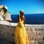 Thuso Mbedu Instagram - My favorite story: My sister was born in April 1989. She was a quiet and sad child. They’d always find her sitting, staring wistfully through the window. She didn’t speak or smile or dance. Then suddenly on the 8th of July 1991 I was born. Her greatest gift. I’m told my sister broke out into song and dance and hasn’t stopped singing. I’m a true light to her which is why I wore yellow today 🥹 My sister (and my family) will deny it but it’s because this is only the first draft😒 don’t listen to em. It sounds better in my head. P.S I lost count on the number of compliments I received on this @farmrio dress 😅😮‍💨 P.P.S Happy birthday to everyone born today. Shout out to my known birthday twins: Bongeka, Amo, Joseph, Mfundo, Craig and Skye🥰 Dubrovnik, Croatia