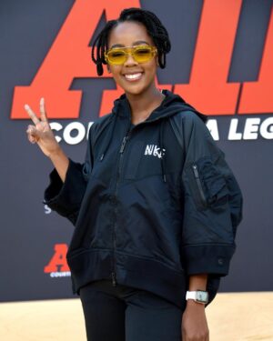 Thuso Mbedu Instagram - A basketball court for a red carpet. Wearing cute sneakers as part of the outfit?! Well, stitch me up and call me Patchy because I’m there like a bear! The @airmovie premiere was tons of fun! The movie is such a beautifully told story. Everyone loved it. Congrats to everyone involved 🫶🏾

Makeup by @makeupbyhendra 
Nike fit courtesy of @nike #RM72