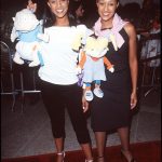 Tia Mowry Instagram - Take two on a trip down memory lane of me and @tameramowrytwo iconic 90’s red carpet looks 💅🏽Fashion is so cyclical, like the leather trench coats, the long skirts, the capris! I feel like I see outfits that are similar all the time on ig nowadays 😂 But I gotta know, which outfits are your favorite 👀