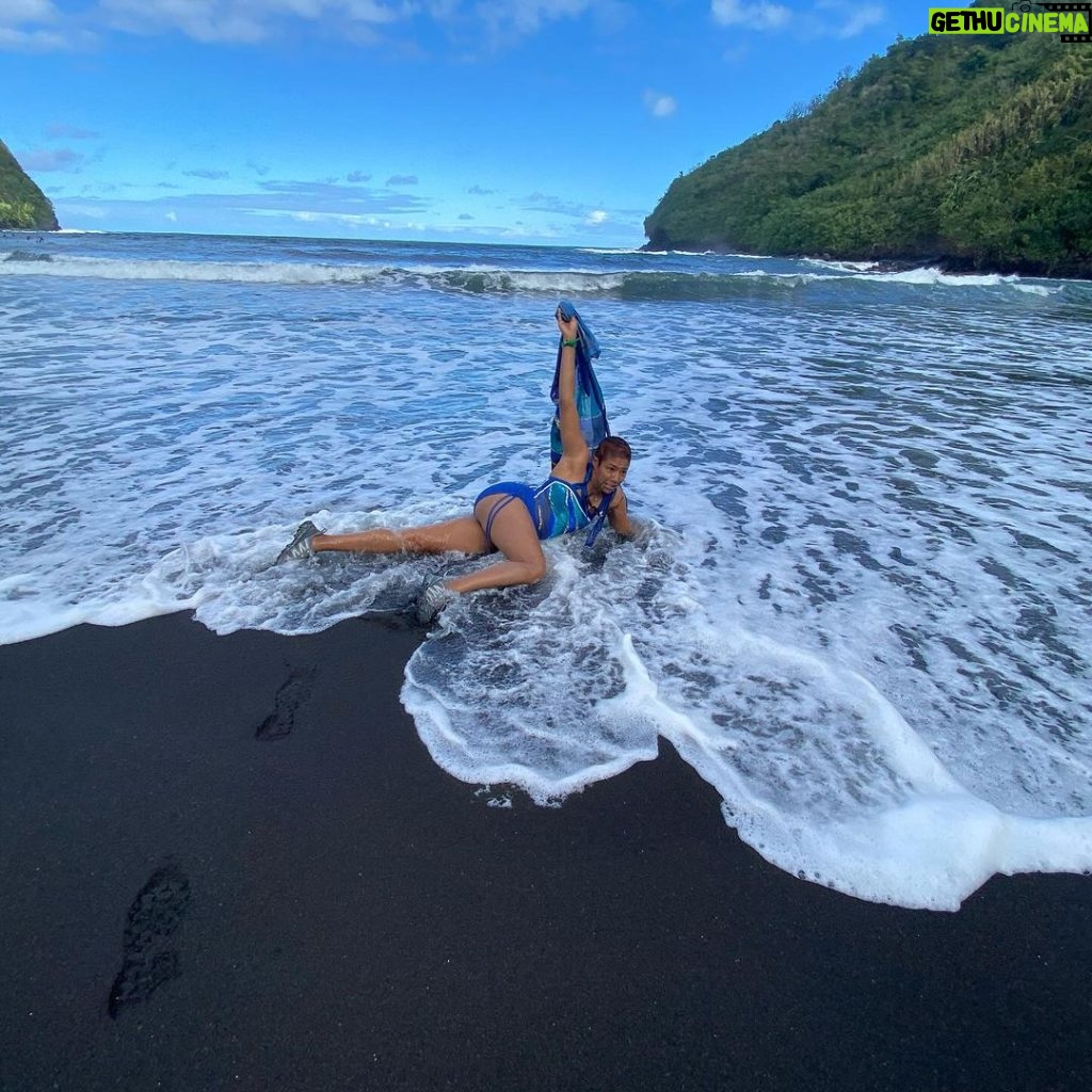 Tiffany Haddish Instagram - I Love being silly on the black sand beach. I have always wanted to do a swimsuit photo shoot. This silly one will do for now #Hana #hawaii #sheready