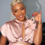 Tiffany Haddish Instagram - Look at me Looking all cute with my little @katespadeny bag. I love my Outfit that @andreaiyamah made. I am starting to think that my Glam team is full of Magicians. @waymanandmicah @ernestocasillas @hair4kicks y’all stay making magic. #sheready #tocute #katespade #andreaiyamah #tiffanyhaddish theafterparty #hauntedmansion #wakeupandmakeup