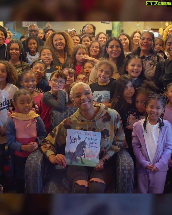 Tiffany Haddish Instagram - This is absolutely the most fun reading to the children and parents at the library is something I Love to do. The kids are so smart and the parents have fun asking silly questions. On this particular day I was in the city of highland at the public library and they had candy for me. So I had hard candy stuffed in my cheeks the whole time I was reading, I won’t do that again. 😁 #laylathelastblackunicorn #sheready #locallibrary