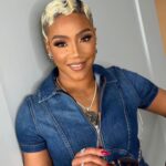 Tiffany Haddish Instagram - I had so much fun today @nascar I met a lot of Good people and had a lot of Laughs. Thank you #Nascar for inviting me to be the honorary starter. Hair by : @hair4kicks Make-up by : @therealjaleah_