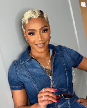 Tiffany Haddish Instagram - I had so much fun today @nascar I met a lot of Good people and had a lot of Laughs. Thank you #Nascar for inviting me to be the honorary starter.  Hair by : @hair4kicks  Make-up by : @therealjaleah_