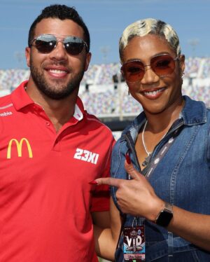 Tiffany Haddish Instagram - I had so much fun today @nascar I met a lot of Good people and had a lot of Laughs. Thank you #Nascar for inviting me to be the honorary starter.  Hair by : @hair4kicks  Make-up by : @therealjaleah_
