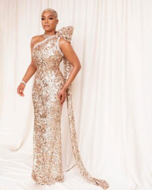 Tiffany Haddish Instagram - I don’t know about you, but tonight I feel like a Gift! I am so excited to share with the real ones! 😘 #grammys @waymanandmicah @hair4kicks @kilprity custom @prada @normansilverman  @mr_dadams #sheready #diswhatmoneylooklike #diswhatfamelooklike #diswhatsuccesslooklike