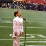 Tisha Campbell Instagram - Gen X and Gen Z in full effect! Giant stadium #nationalathum and #themartinshowreunion #pinksuit