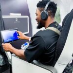 Tobi Bakre Instagram - It was exciting flying with British Airways. I experienced top tier service on my trip to London. From Priority Boarding, extra baggage space up to 23kg, wider seats and more leg room, It was all on point. Totally enjoyed my flight to London, with @british_airways #BritishAirways #Sponsored