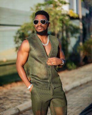 Tobi Bakre Instagram - #SlumKing!!! 

We gave them a masterpiece yesterday! Outfit and film!

No be shereyshrey. From Sunday! Plug innnnnnnnnn on @africamagic we made a BANGER!!!!!!!!

Outfit- @emmykasbit 
📸- @presleyvisuals
Iced out jewelry from @bozjewelry