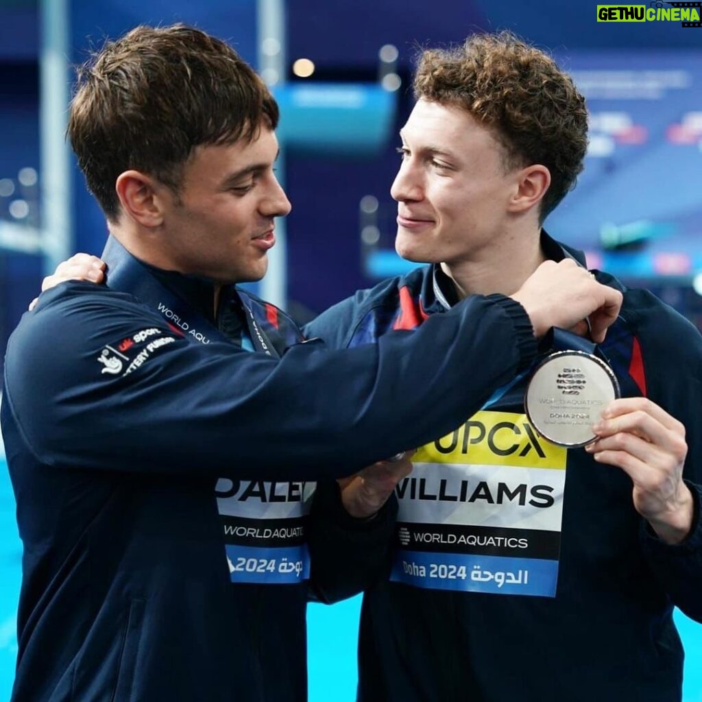 Tom Daley Instagram - OLYMPIC QUOTA SPOT! 🇬🇧🔥🫶 (read more for story time) • • To qualify for the Olympics can be quite a stressful and complicated process. • There are two opportunities: Top 3 at World Champs the year before the Olympics. Or Top 8 if the already qualified teams are in that top 8. (France gets a quota spot as host!) • Going into the World champs, we knew there would be 20+ teams fighting for those spots. It all comes down to 1 event. 6 dives. To make the Olympics…or Not! • It is an extremely high pressure and high stakes situation. A situation that a year ago I would never have imagined being in. • Since coming back to the sport last summer, I’ve been working my butt off to make that dream a reality! Getting a silver medal and Olympic quota spot is just the first step in getting there. But excited for what is to come! • A huge thank you goes out to my wonderful husband, @dlanceblack for supporting me on this CRAZY journey! • To @noah_w9 for putting up with my intensity going into competition. • To @janefig1218 for believing in me to do this again! • To @ucla_diving for taking me in as an honorary team mate and getting me back to it! • To @train4success20 for conditioning me to fitness! • To @a2zelitehealth @corey_newton and @drkatejordan for putting me back together when I fall apart! • To @hannahstoyel for being a sounding board. • To @taraboening for watching what I eat. • To my team @ymuentertainment @carverpr_ @creativeartistsagency for navigating this plot twist of a year! • It really does take a village to make an Olympic athlete and often go unrecognised! But I appreciate each and every one of you for supporting me on this journey!